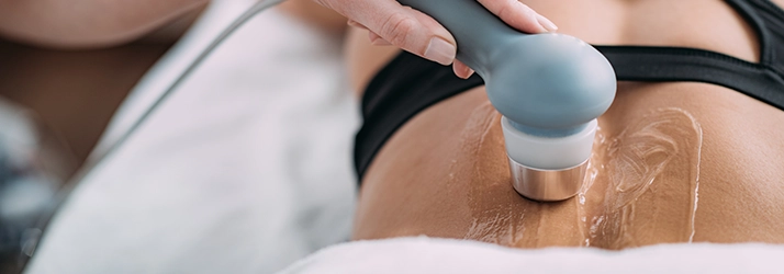 Ultrasound being performed on a persons back.