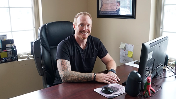 Chiropractor Michael Krueger At Desk